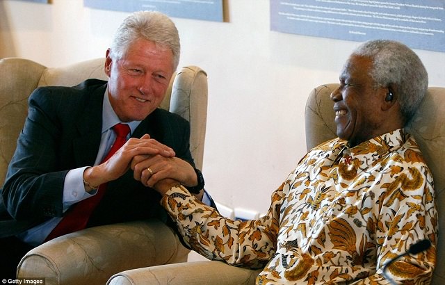 Former U.S. President Bill Clinton with Nelson. Nelson was 89