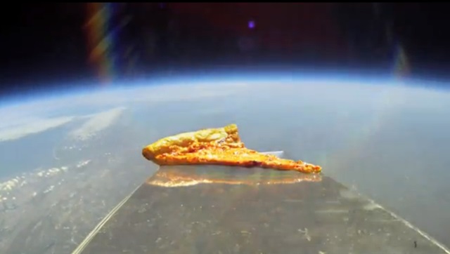 This is an actual photo of pizza that was sent in space by someone. 